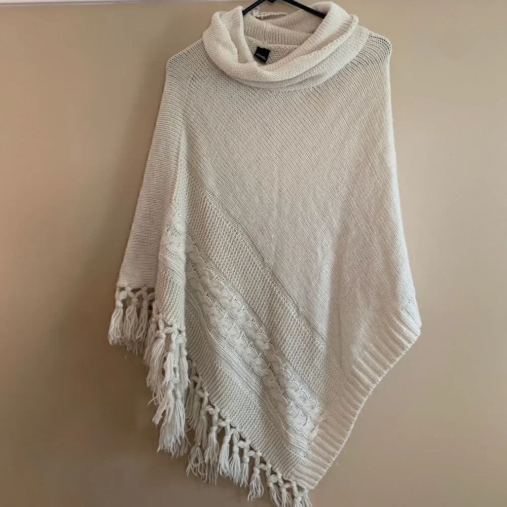 Loft Sweater cream poncho with fringe trim